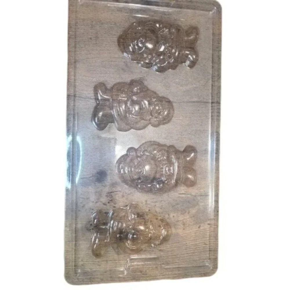 Wilton Christmas 3-Piece Candy Mold Set Snowflakes Gingerbread Men Santa Shapes